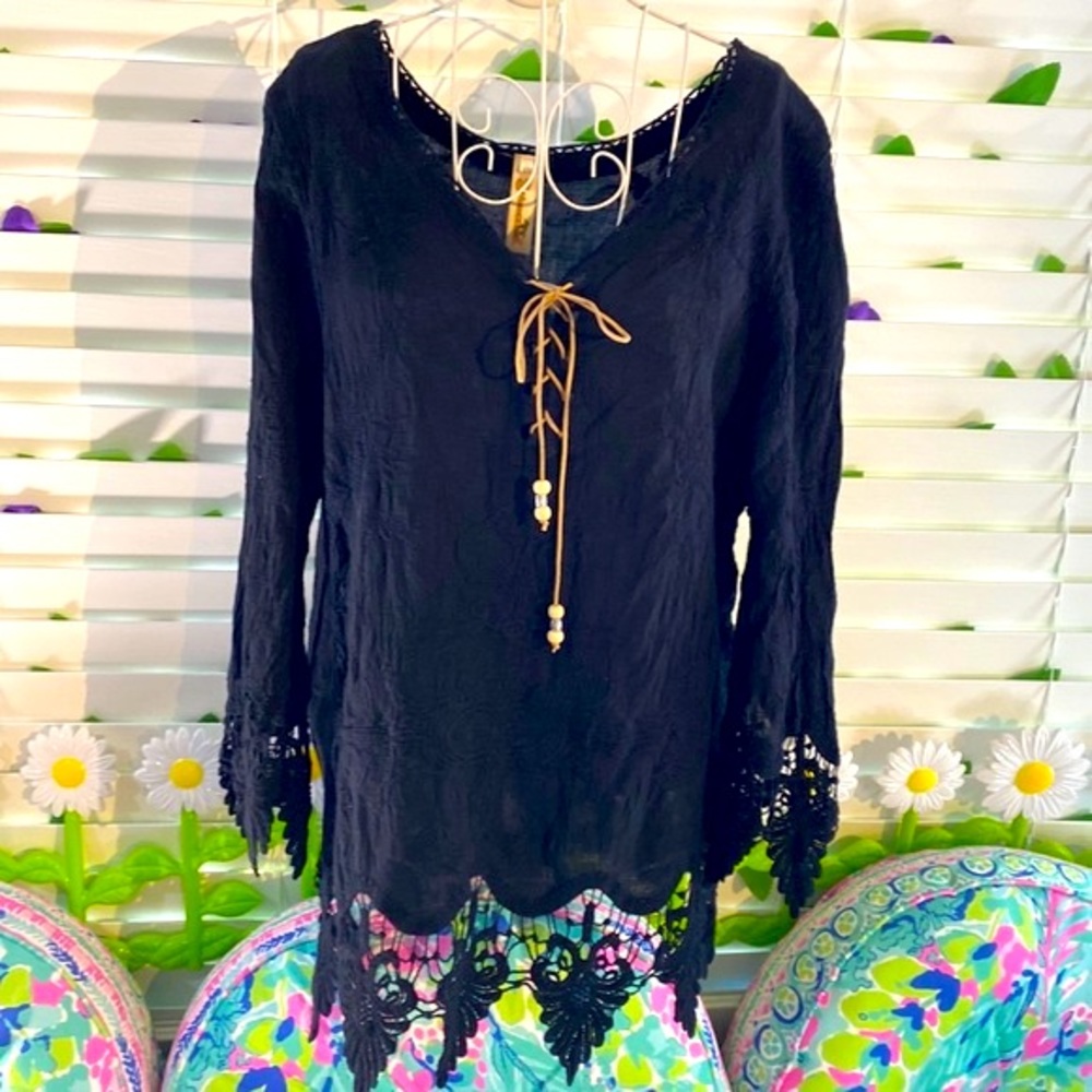 Shoreline boho black lace up top with lace cuffs and hem